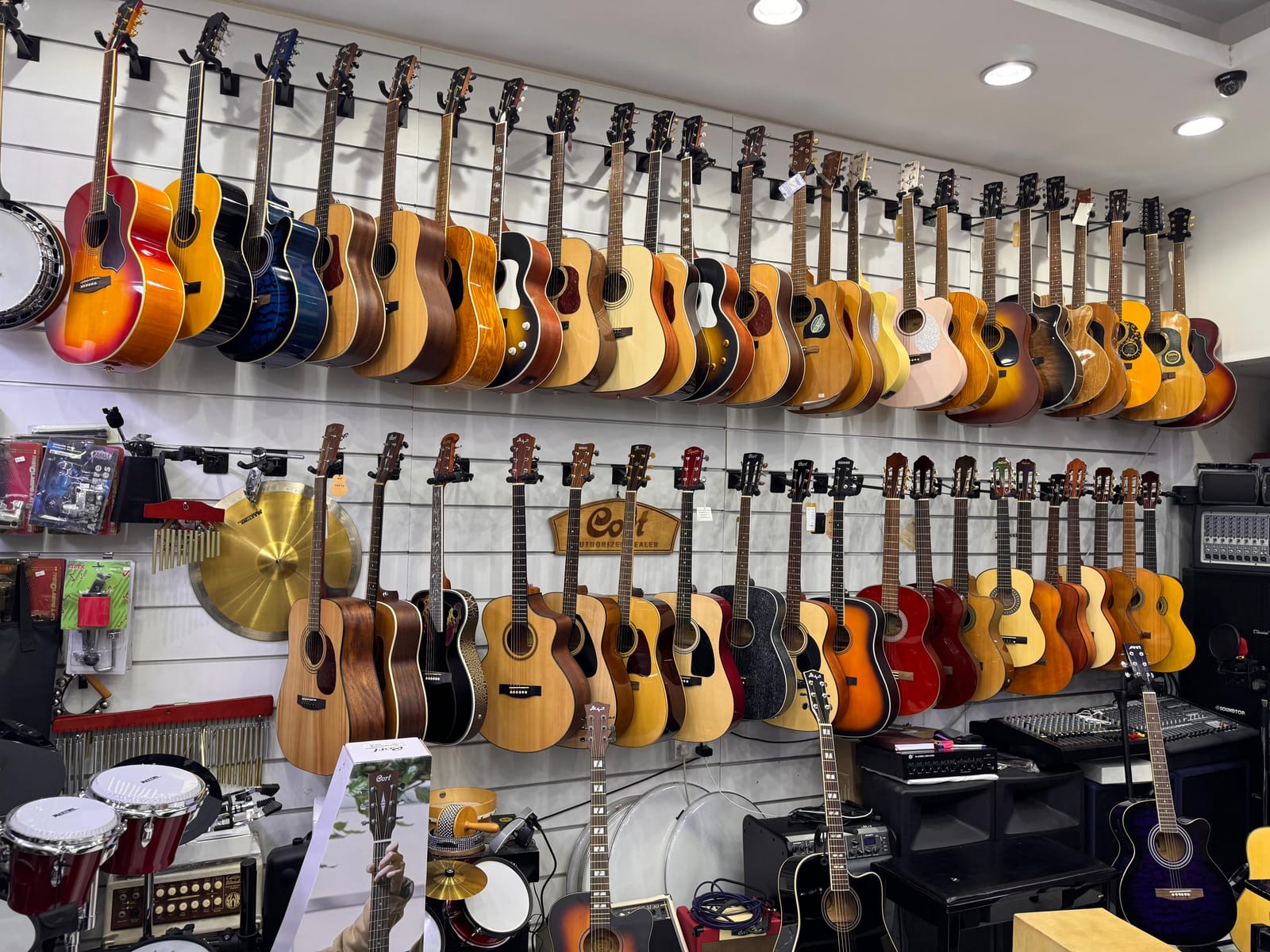 Guitar wall inside the AKM Music showroom